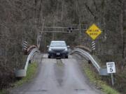 The days are numbered for the wood bridge which is the sole access point to the River ‘S’ unit of the Ridgefield National Wildlife Refuge. The U.S. Fish and Wildlife Service plans to replace it with a two-lane concrete bridge that will also go above the train tracks, thus eliminating the at-grade crossing. Work is expected to take place in 2019.