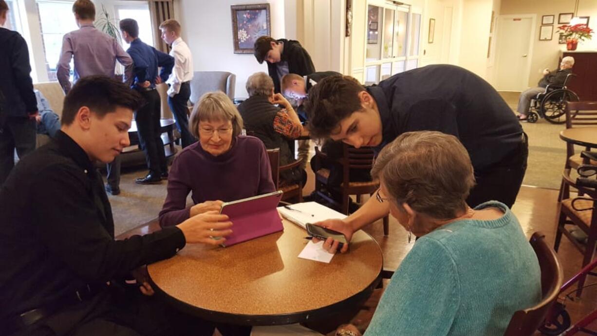 Fairway-164th Avenue: Shahala Middle School basketball players visited Touchmark at Fairway Village Retirement Community to host a techie boot camp, where they helped residents troubleshoot issues and shared their expertise.