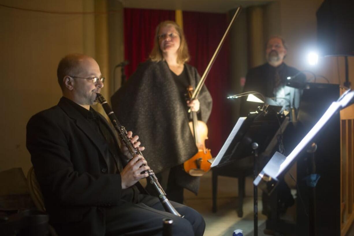 Igor Shakhman of Vancouver Symphony warms up on his clarinet as he prepares to play along with the silent film “The Mark of Zorro” Sunday at the Kiggins Theatre.