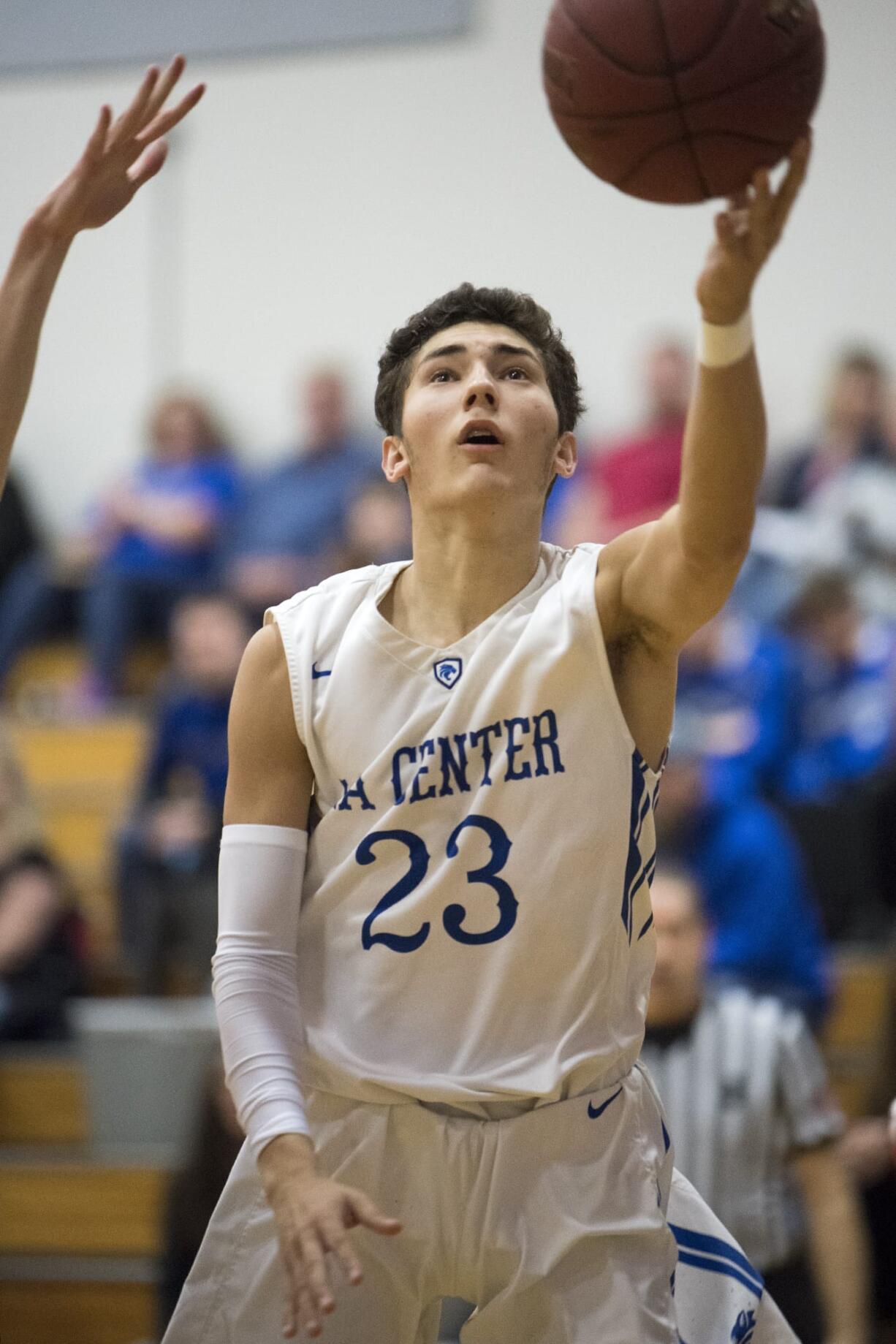 La Center's Hunter Ecklund (23) shoots a layup during Tuesday night's game at La Center High School on Jan. 30, 2018. La Center defeated Columbia-White Salmon 88-78.