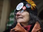 Opponent of the proposed Vancouver Energy oil-by-rail terminal Edith Gillis of Portland celebrates the project's rejection Monday by Washington Gov. Jay Inslee at the Slocum House in downtown Vancouver on Jan. 29, 2018.