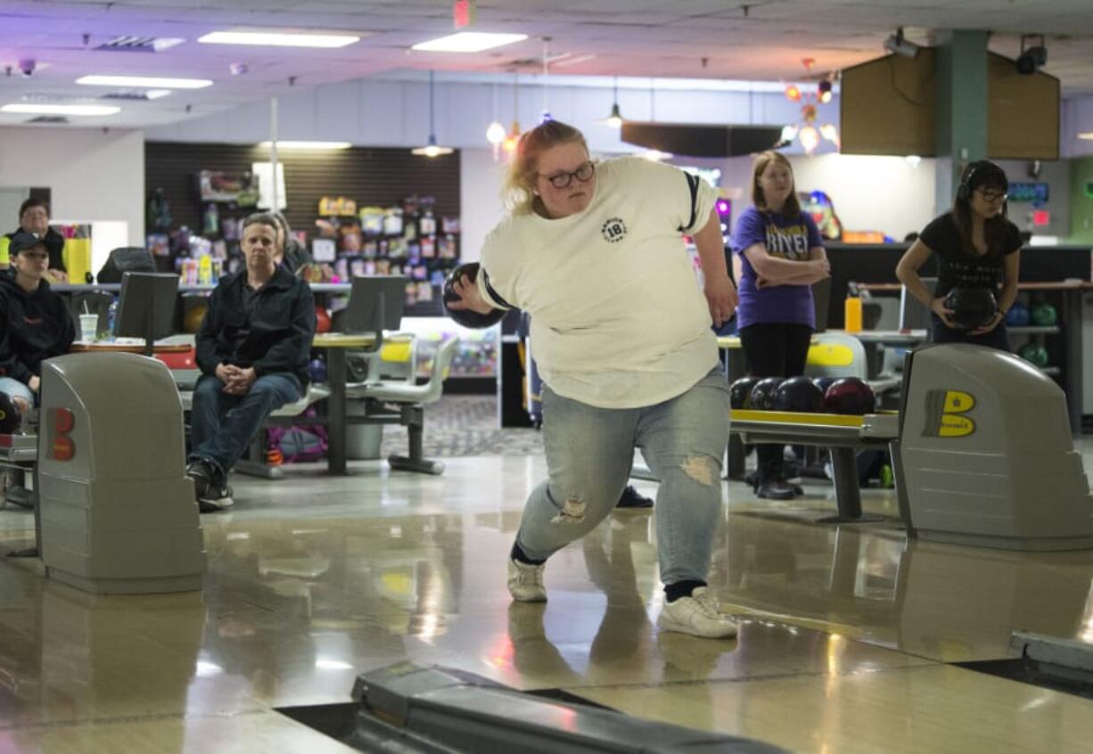 Jasmine ‘Jazzie’ Martin, a senior at Hudson's Bay High School, bowls during practice with her teammates at Allen's Crosley Lanes in Vancouver, Tuesday January 30, 2018. Martin, who is deaf, has bowled all four years with the Eagles bowling team and is currently having her best season. The Eagles are headed to the state tournament this Thursday and Friday.