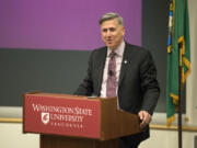 Washington State University Vancouver Chancellor Mel Netzhammer speaks at the State of the Campus address at the Salmon Creek university on Wednesday. Netzhammer addressed enrollment, construction and the campus budget in his speech.