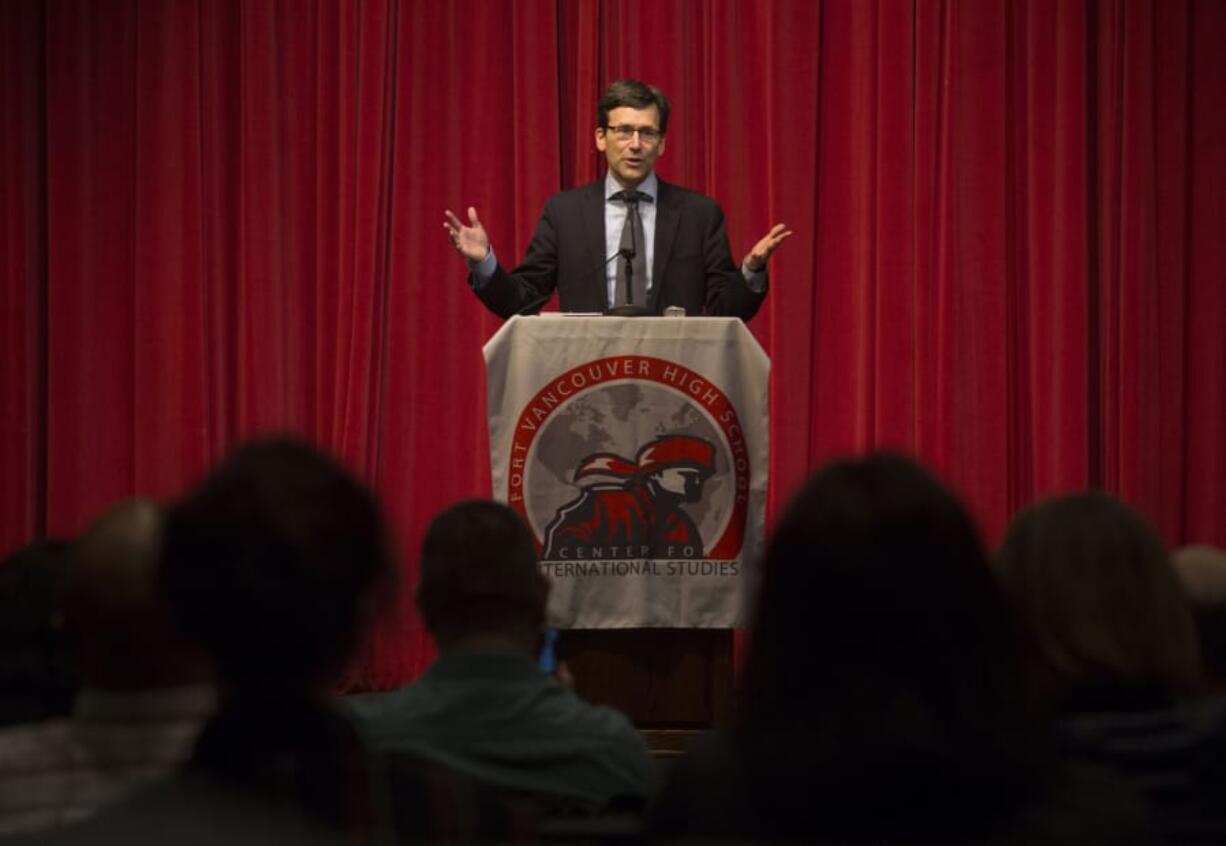 Washington Attorney General Bob Ferguson addresses a receptive crowd at Fort Vancouver High School on Tuesday night.