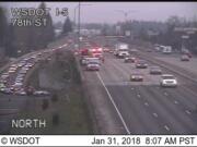 Three vehicles are involved in a crash on an Interstate 5 overpass at Northeast 78th Street. One person suffered minor injuries, according to emergency radio traffic monitored at The Columbian.