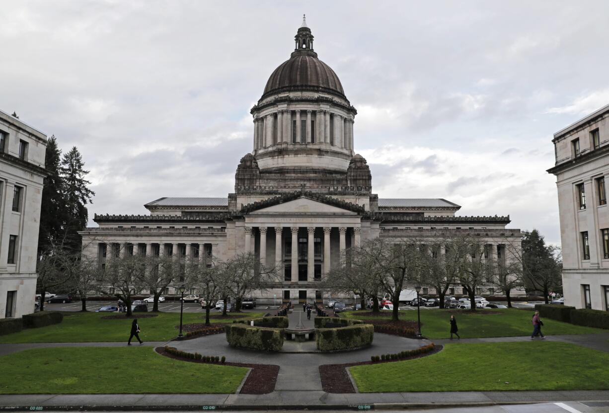 In this Jan. 5, 2018 photo, the Legislative Building is shown at the Capitol in Olympia.  (AP Photo/Ted S.