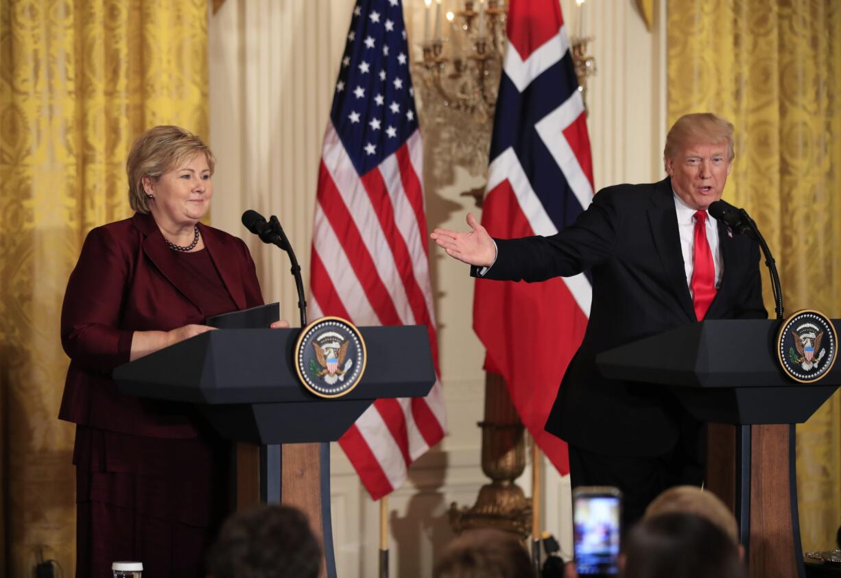 FILE - In this Wednesday, Jan. 10, 2018 file photo, US President Donald Trump speaks during a joint news conference with Norwegian Prime Minister Erna Solberg in the East Room of the White House in Washington.  Africans woke up on Friday Jan. 12, 2018 to find President Donald Trump taking an interest in their continent.