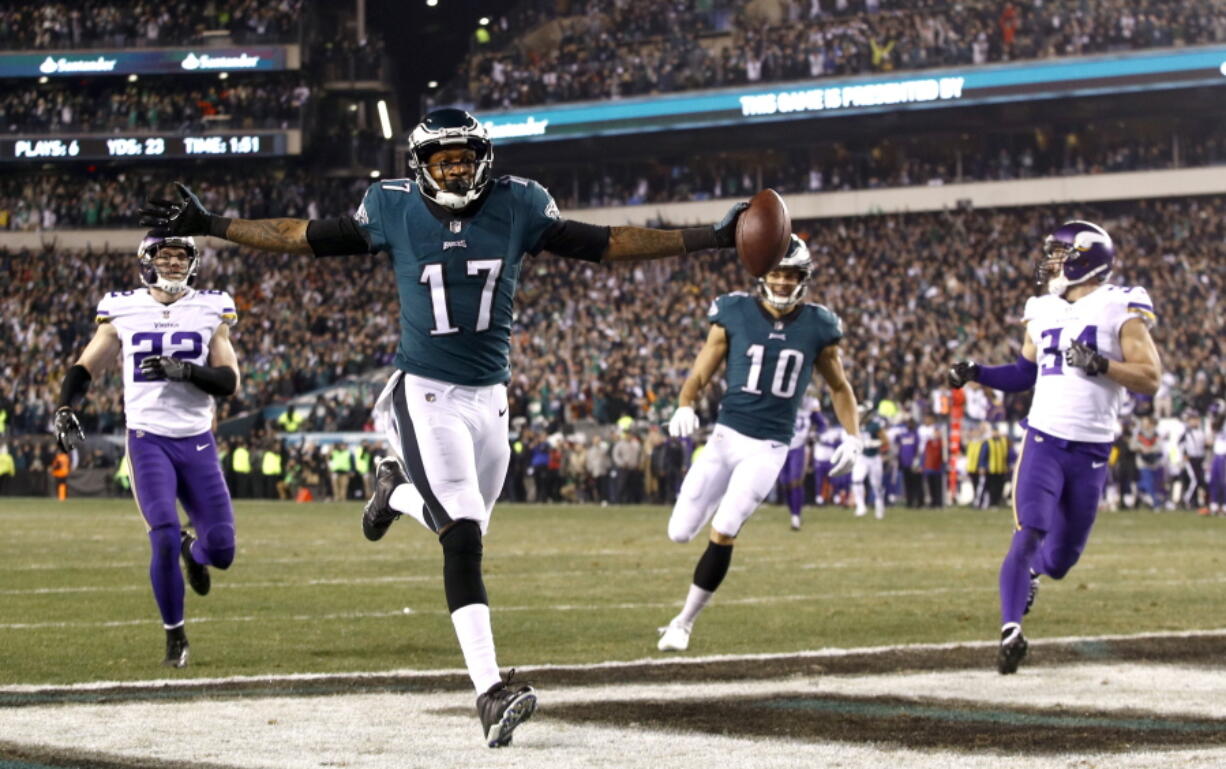 Philadelphia Eagles’ Alshon Jeffery catches a touchdown pass during the first half of the NFL football NFC championship game against the Minnesota Vikings Sunday, Jan. 21, 2018, in Philadelphia.