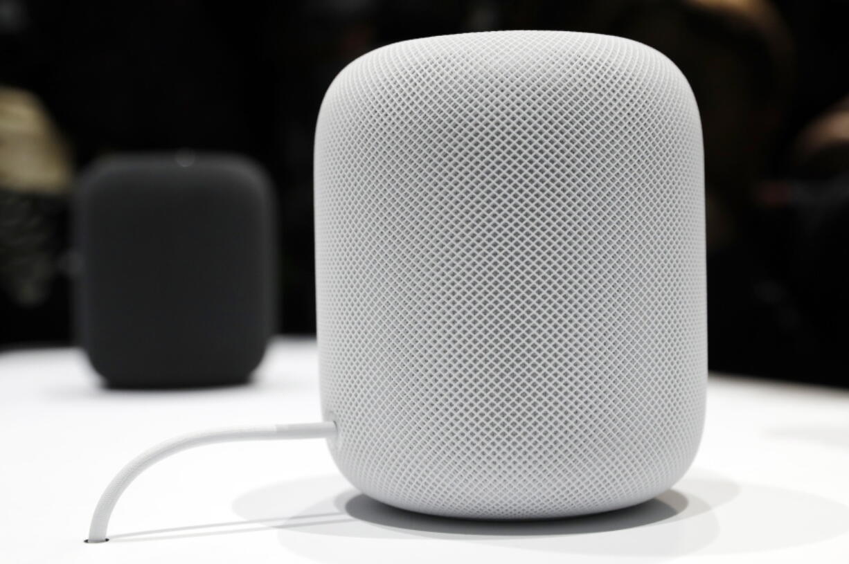 FILE - In this Monday, June 5, 2017, file photo, the HomePod speaker appears on display during an announcement of new products at the Apple Worldwide Developers Conference in San Jose , Calif. Pre-orders for the HomePod will begin Friday, Jan. 26, 2018, in the U.S, U.K. and Australia, two weeks before the speaker goes on sale in stores.