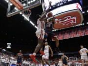 Arizona guard Allonzo Trier (35) shoots against Washington State forward Robert Franks (3) during the first half of an NCAA college basketball game in Pullman, Wash., Wednesday, Jan. 31, 2018.