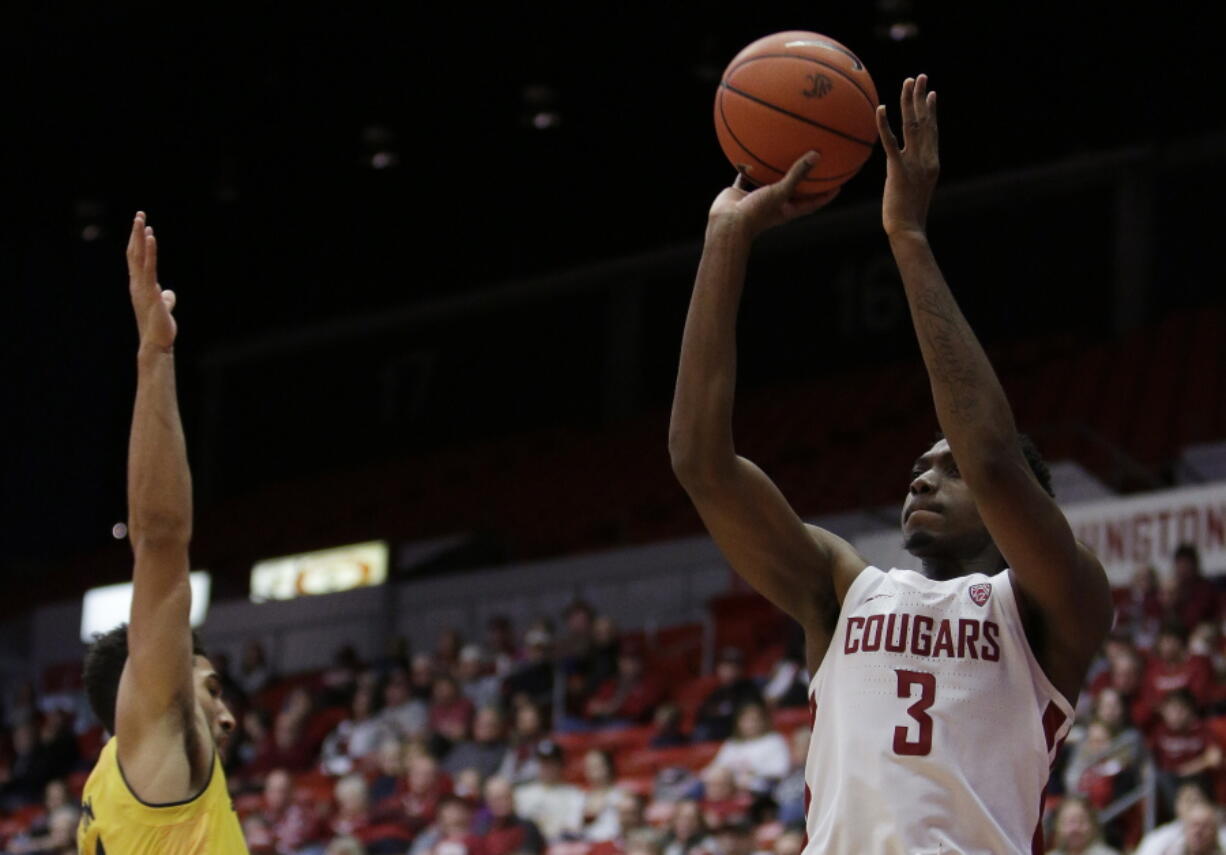 Washington State forward Robert Franks (3) shoots against California guard Nick Hamilton during the second half of an NCAA college basketball game in Pullman, Wash., Saturday, Jan. 13, 2018. Washington State won 78-53.