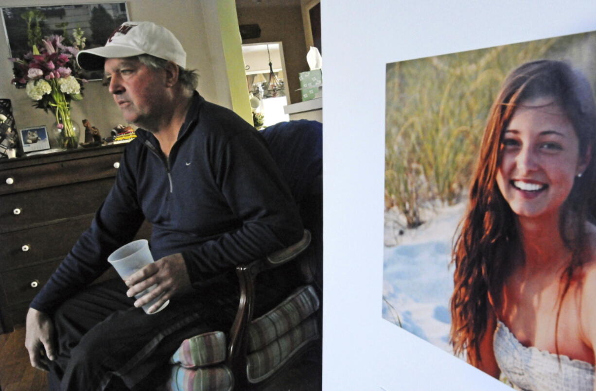 James Holleran, father of Madison Holleran, a University of Pennsylvania freshman who took her own life, talks about his daughter while sitting next to a favorite photo of her at his home in Allendale, N.J. Nearly half of the largest U.S. public universities do not track suicides among their students, despite making investments in prevention at a time of surging demand for mental health services. After her 2014 suicide, one of her former teachers in New Jersey was surprised to learn learn many universities don’t report suicide statistics.