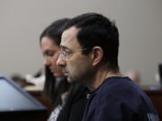 Dr. Larry Nassar is seated during the seventh day of his sentencing hearing Wednesday in Lansing, Mich. Nassar has admitted sexually assaulting athletes when he was employed by Michigan State University and USA Gymnastics, which is the sport’s national governing organization and trains Olympians.