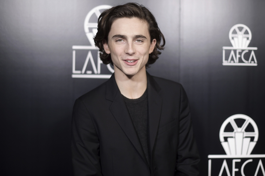 Timothee Chalamet attends the 43rd Annual Los Angeles Film Critics Association Awards in Los Angeles. Chalamet said he will donate his salary for an upcoming Woody Allen film to charities fighting sexual harassment and abuse.