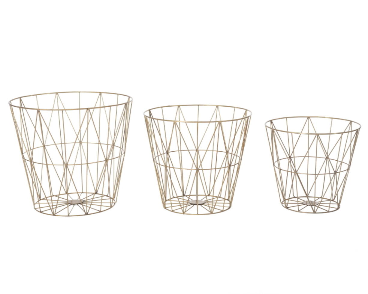 Designer Annie Selke’s wire waste basket sets.