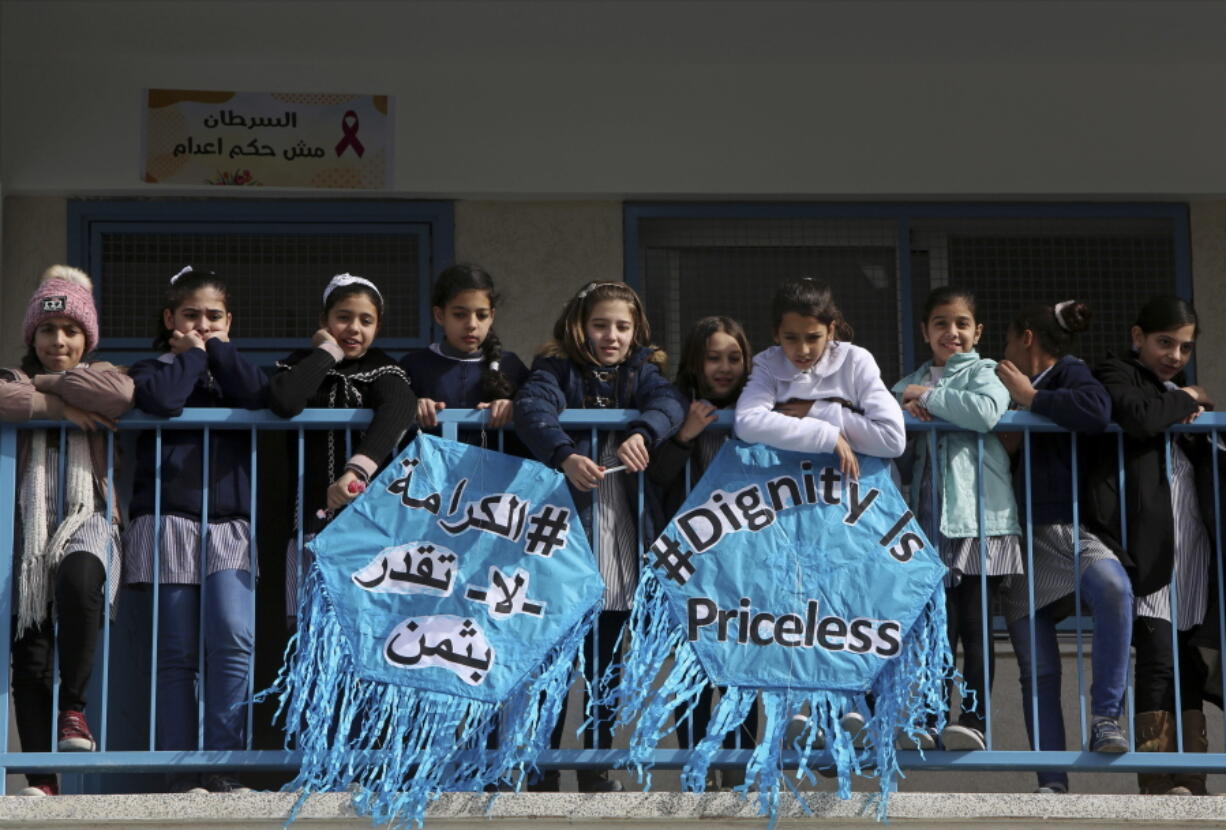 Refugee school girls listen to Mr. Pierre Krähenbühl, Commissioner-General of the United Nations Relief and Works Agency for Palestine Refugees, during his press conference to launch a global campaign to support UNRWA, at the UNRWA Rimal Girls Preparatory School in Gaza City, Monday, Jan. 22, 2018. The main U.N. agency for Palestinian refugees launched Monday the “unprecedented” appeal seeking hundreds of millions of dollars in response to funding cuts by the Trump administration.