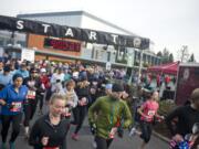 Runners start the 10k race during Clark Public Utilities' annual Race for Warmth in Vancouver on Sunday, Jan. 29, 2017. The fun-run raises money to help people struggling to pay their electric bills. The 2018 run is scheduled for Jan. 28.