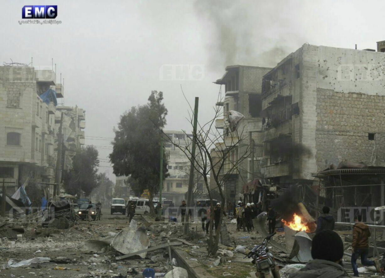 Members of the Syrian civil defense known as the White Helmets, gathering at a street which was attacked by Russian airstrikes, in Maarat al-Nuaman, Syria. Just weeks after Russian President Vladimir Putin declared victory in Syria, Russian military outposts in the country have come under rebel attacks that are challenging Moscow’s gains. The incursions have raised doubts both about the sustainability of the Syrian government’s recent victories and Moscow’s ability to protect its assets in the country.