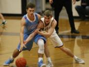 Jacob Hjort, right, of Columbia River defends against Gage Hendrickson of Mark Morris.