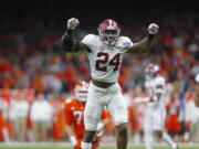 Alabama linebacker Terrell Lewis (24) reacts after nearly intercepting a pass in the second half of the Sugar Bowl semi-final playoff game against Clemson for the NCAA college football national championship, in New Orleans, Monday, Jan. 1, 2018.