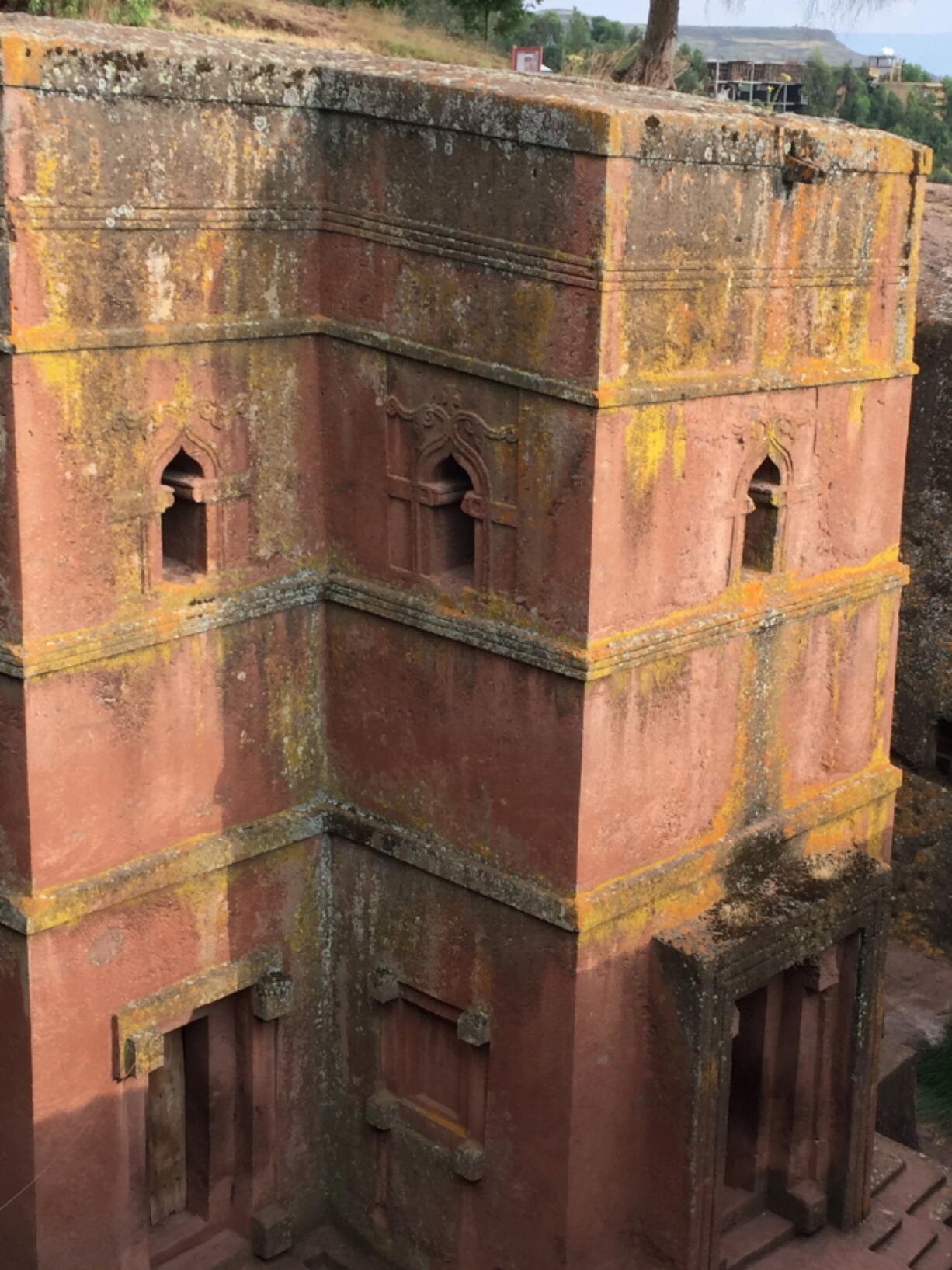 FILE - This Oct. 16, 2017, file photo, shows one of the 12th century churches carved from stone in Lalibela, Ethiopia. The architectural marvels are one of the country’s most magical attractions, miracles of engineering built 8,000 feet above sea level, each carved in one piece directly from soft volcanic rock.