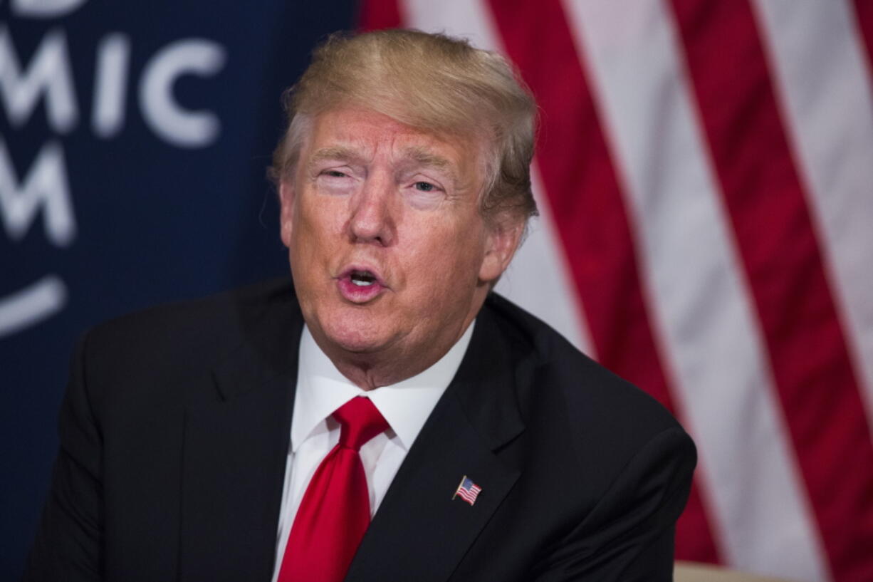 U.S. President Donald Trump speaks during a meeting with Rwandan President Paul Kagame at the World Economic Forum, Friday, Jan. 26, 2018, in Davos, Switzerland.