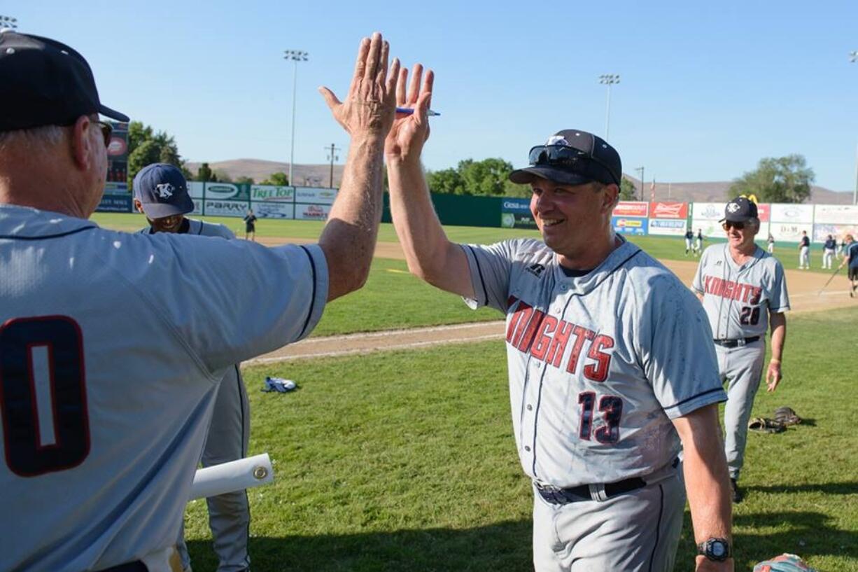 King's Way Christian coach Ty Singleton celebrates the Knights state championship last May.