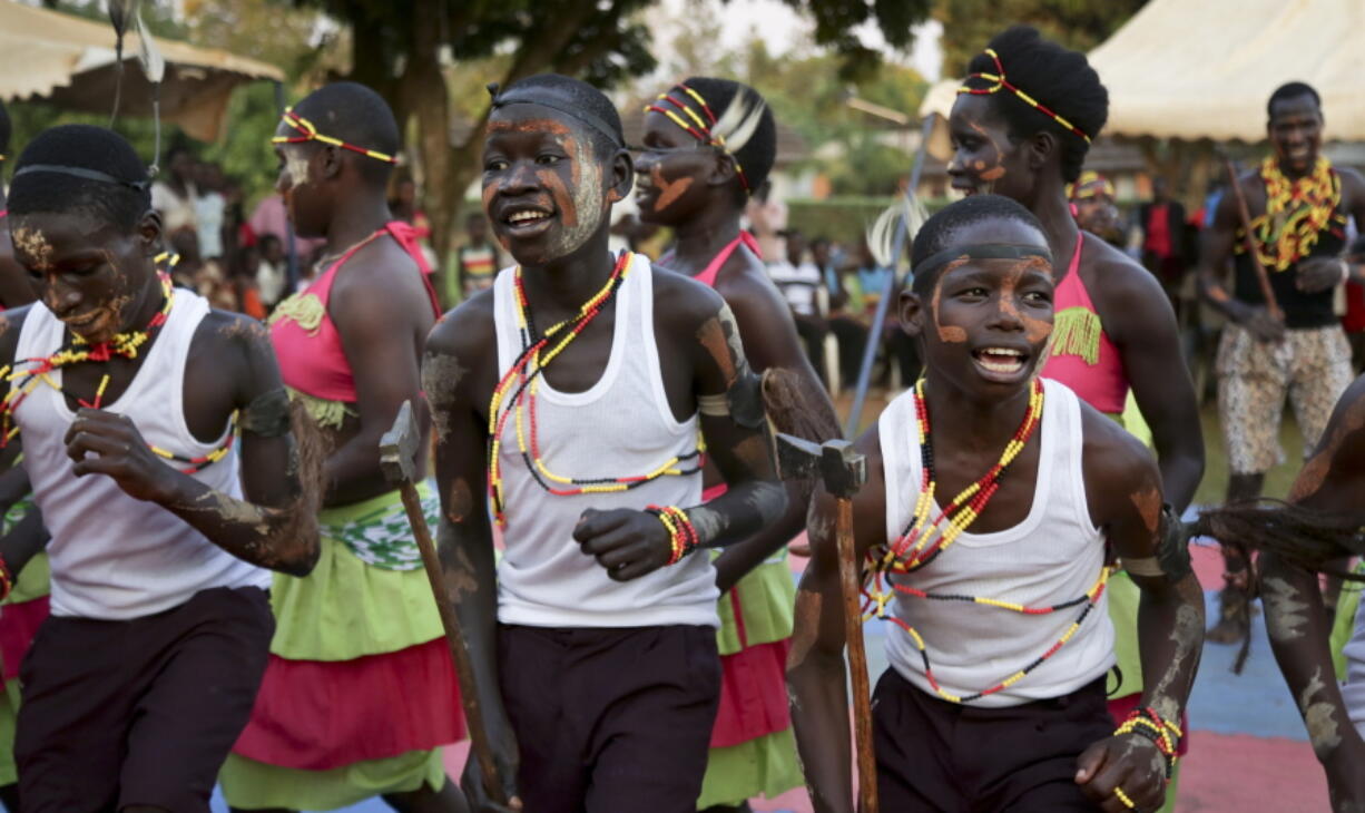 Former child soldiers of the Lord’s Resistance Army and community members make a traditional Acholi dance performance at a music therapy pilot program in Gulu, Uganda. A brutal rebellion by the LRA brought years of suffering to the people of northern Uganda and now that the fighting is over, a group of former child soldiers is helping some heal through music therapy.