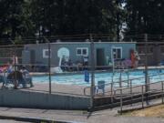 A chain link fence surrounds the Camas Municipal Pool at Crown Park. The city might demolish the pool this year while deciding on whether to build a new leisure pool or a splash pad.