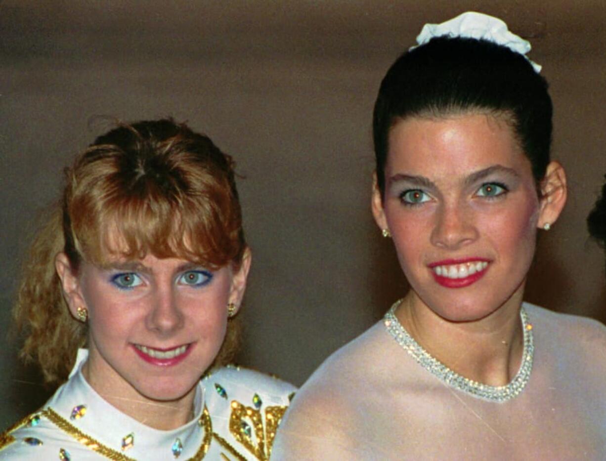 Tonya Harding, left, and Nancy Kerrigan at the U.S. figure skating championships in January 1992, a month before the Winter Olympics.