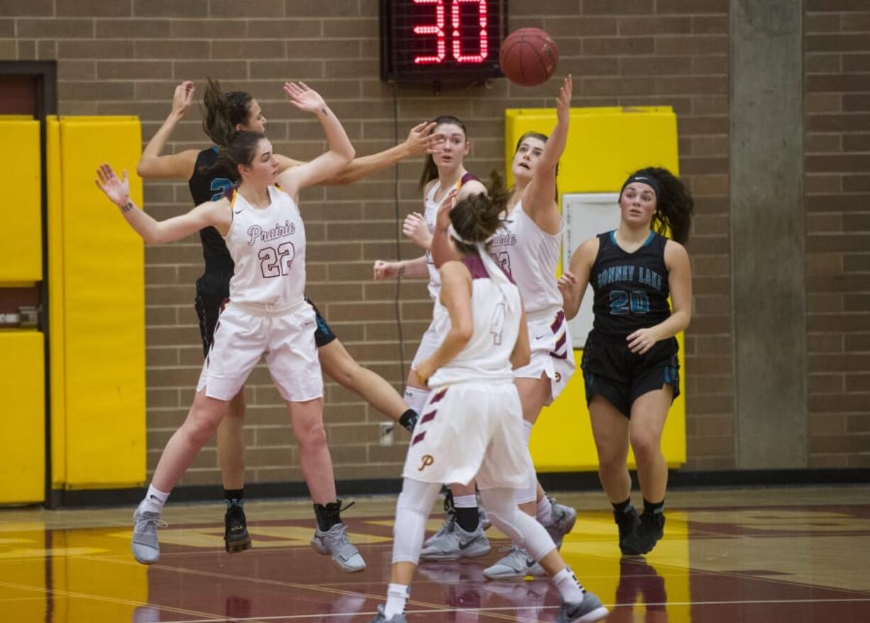 Prairieís Mallory Williams (13) reaches out to catch the ball during the first round of the 3A bi-district girls basketball tournament against Bonney Lake at Prairie High School, Wednesday February 7, 2018.