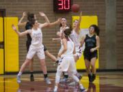 Prairieís Mallory Williams (13) reaches out to catch the ball during the first round of the 3A bi-district girls basketball tournament against Bonney Lake at Prairie High School, Wednesday February 7, 2018.