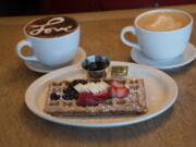 Macy’s made-from-scratch waffles with organic maple syrup, special coffee and latte at Macy’s European Coffee House and Bakery, Flagstaff, Ariz.