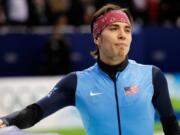 USA’s Apolo Anton Ohno cools down after skating in the men’s 5,000-meter relay short track finals during the 2010 Winter Olympics in Vancouver, B.C., on Feb. 26, 2010.