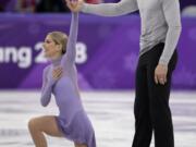 Alexa Scimeca Knierim and Chris Knierim of the USA react after their performance in the pairs free skate figure skating final in the Gangneung Ice Arena at the 2018 Winter Olympics in Gangneung, South Korea, Thursday, Feb. 15, 2018.