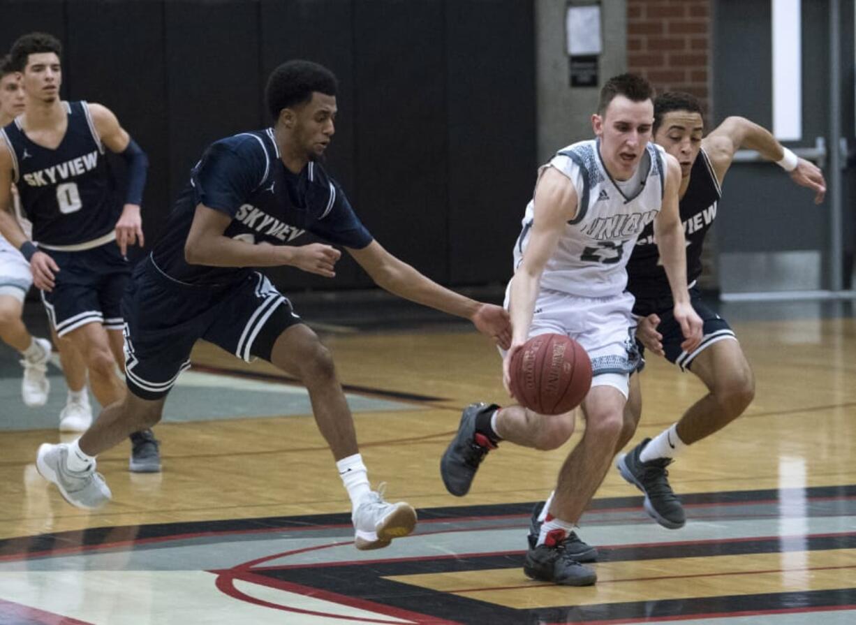 Union’s Ethan Smith has worked hard to make himself more than just a spot-up shooter on the Union boys basketball team.