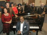 Members of Divine Hope on February 13, 2018, in Akron, Ohio, at Arlington Church of God. Seated is Charles Myricks, Jr. Standing from left, Carla Conley Davis, John Christopher Davis, Leslie Parker Barnes, Robin Parker-Davis, Samuel Gordon, Victor Head, and Stan Davis.