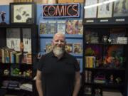 Owner Chris Simons said he keeps thinking his thriving career as comics maven is too good to be true, and somebody’s going to make him go get a real job.