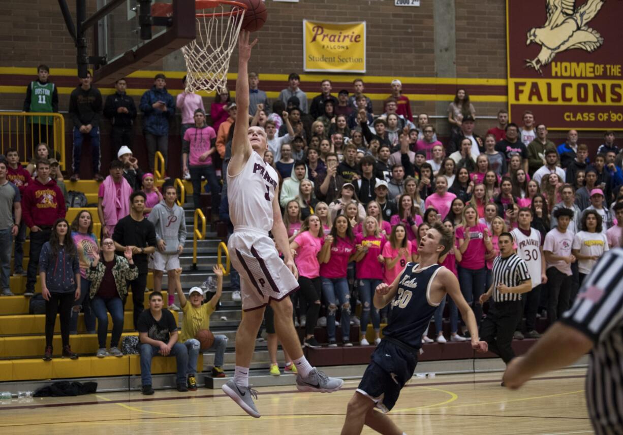 Prairie's Kameron Osborn (3) shoots during the final moments of Friday night's game at Prairie High School in Vancouver. Prairie won 64-55.