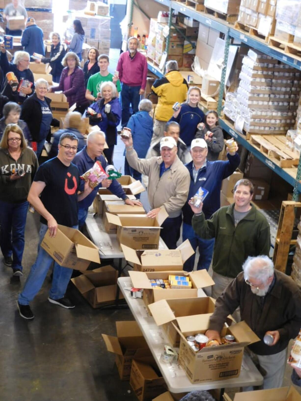 Esther Short: More than 70 volunteers spent their Martin Luther King Jr. Day of Service sorting through food at FISH of Vancouver.