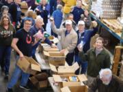 Esther Short: More than 70 volunteers spent their Martin Luther King Jr. Day of Service sorting through food at FISH of Vancouver.