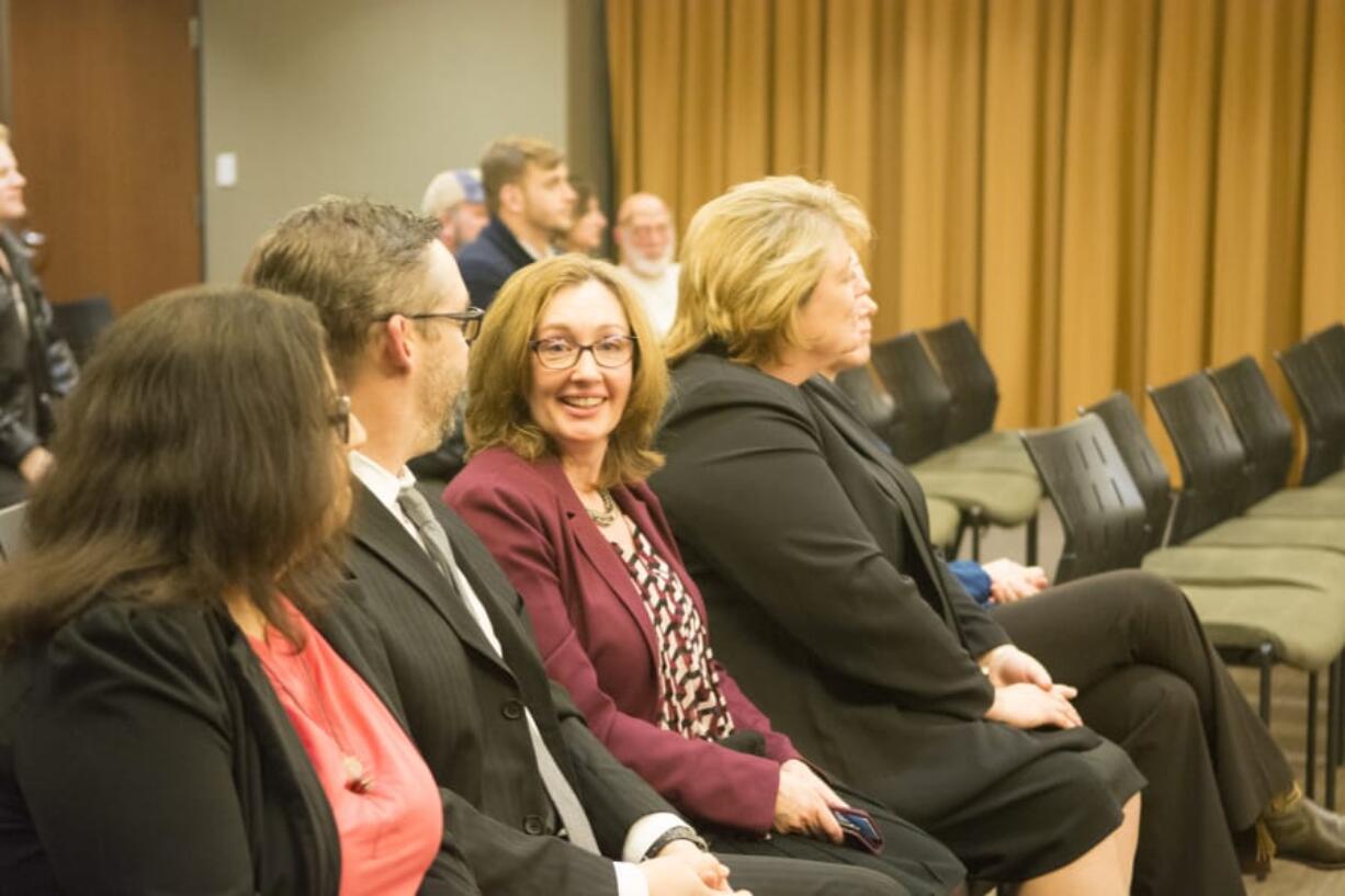 Laurie Lebowsky, center, was appointed to the Vancouver City Council on Monday night. She fills a vacancy for Position 1.