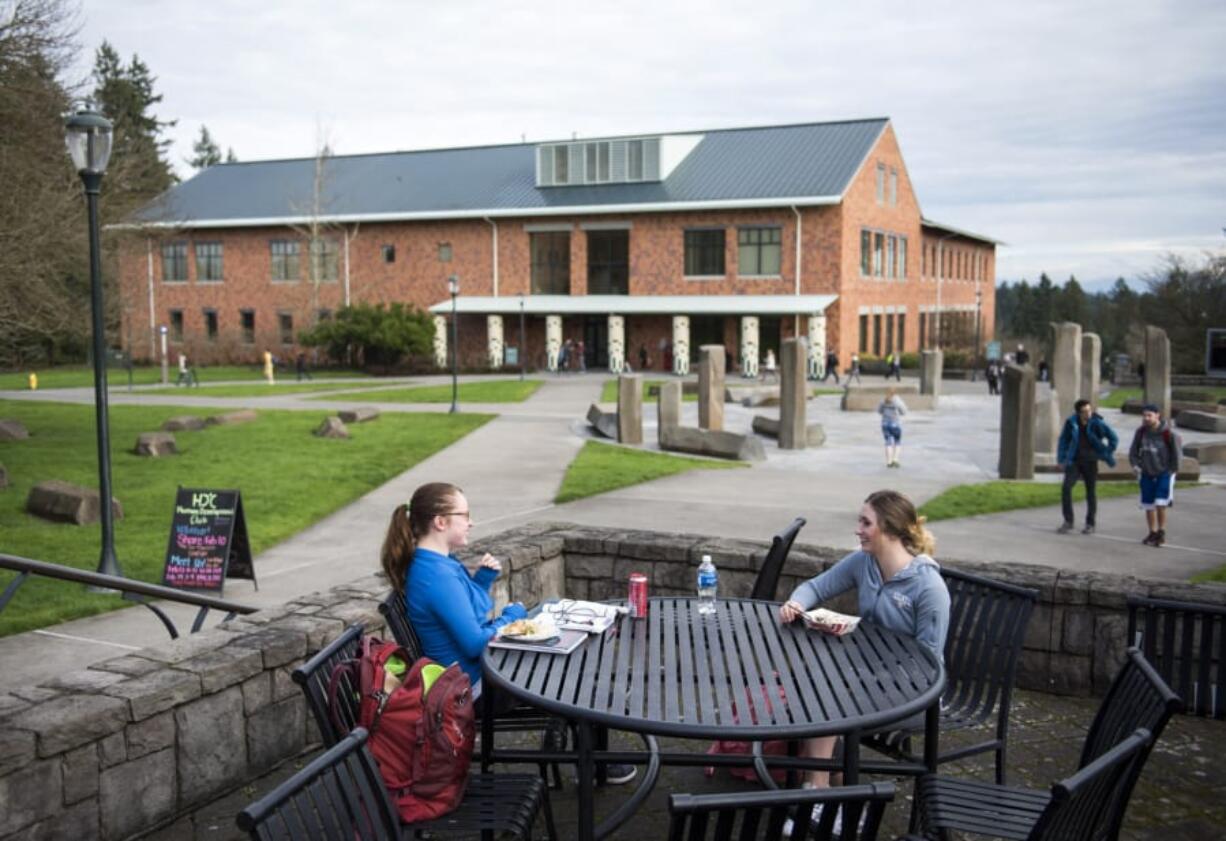 Kimberly Houglum of Kalama, left, and Ashlynn Dean of Longview take a lunch break between classes at Washington State University Vancouver in February 2018.