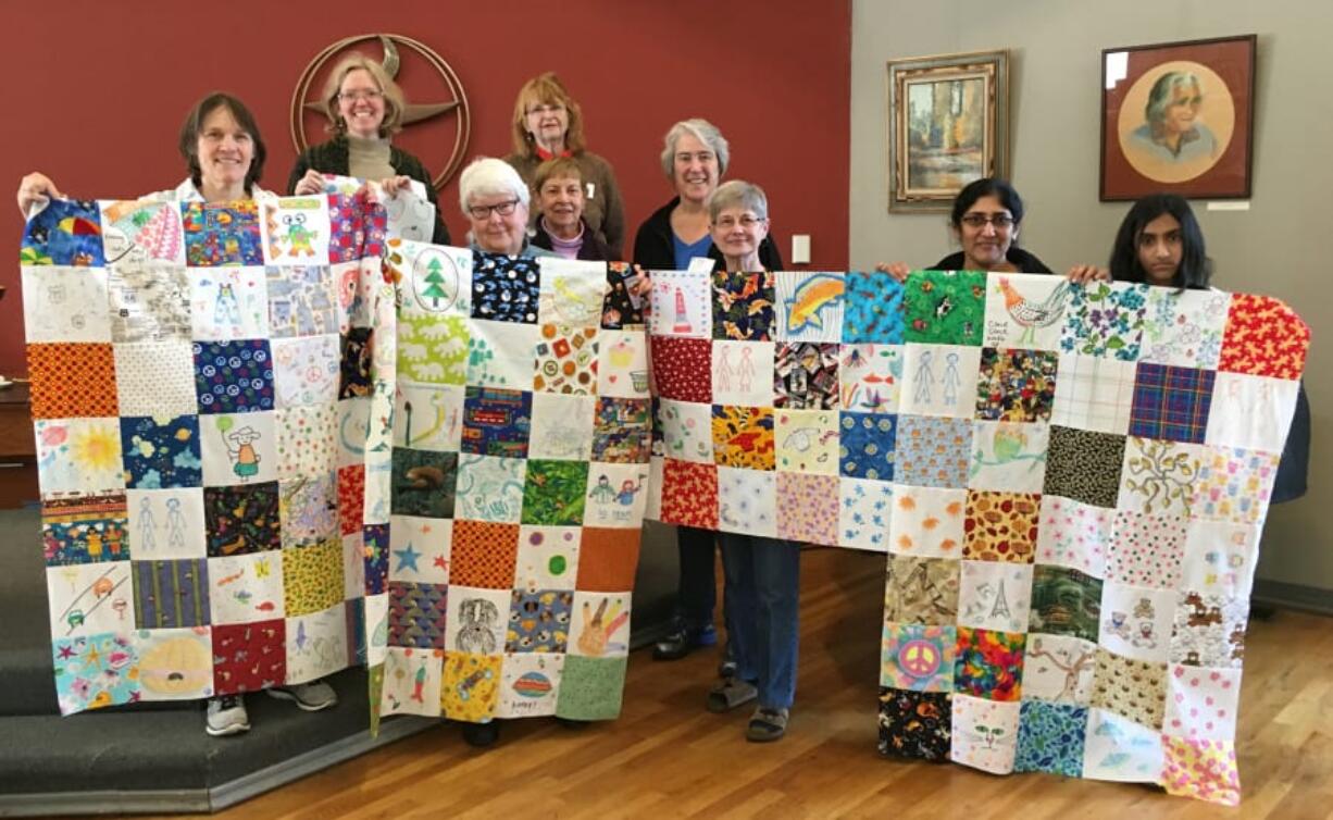 Meadow Homes: Members of the Unitarian Universalist Church of Vancouver congregation and volunteers from Project Linus worked on a Martin Luther King Jr. Day of Service project to make blankets to hand out to children in need around Vancouver.