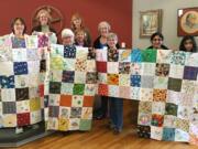 Meadow Homes: Members of the Unitarian Universalist Church of Vancouver congregation and volunteers from Project Linus worked on a Martin Luther King Jr. Day of Service project to make blankets to hand out to children in need around Vancouver.