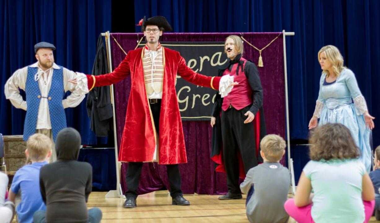 Woodland: Vancouver-based Opera Quest Northwest puts on free opera performances for elementary school students. From left, David Warner, Bruce Kyte, Patrick Scofield and Amy Cole, recently performed at Yale Elementary School students.