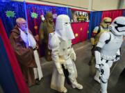 Participants dressed as characters from “Star Wars” enjoy the festivities of the first I Like Comic Con comics convention at the Clark County Event Center on Sunday afternoon. Organizers estimated 6,000 to 8,000 people visited the event over the weekend.