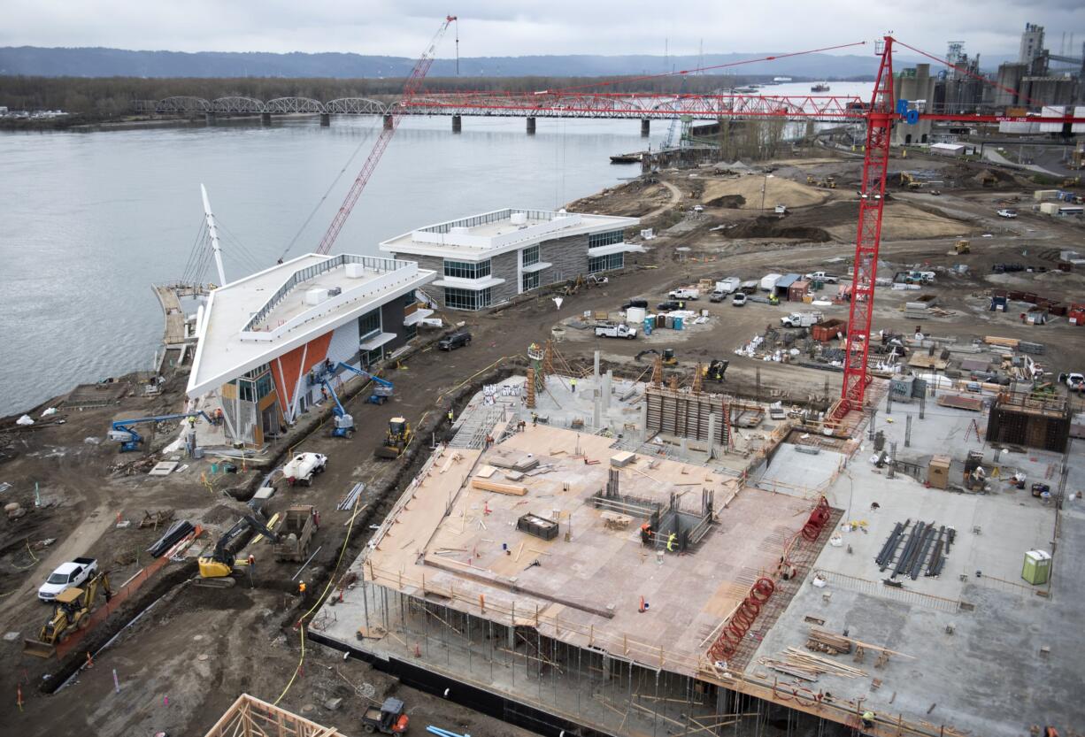 Construction continues Friday afternoon, Feb. 9, 2018, at The Waterfront Vancouver. Development around Grant Street Pier and two restaurants continues to the left, while apartments and retail space begin construction on Block 8 to the right.