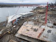 Construction continues Friday afternoon, Feb. 9, 2018, at The Waterfront Vancouver. Development around Grant Street Pier and two restaurants continues to the left, while apartments and retail space begin construction on Block 8 to the right.