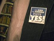 Evergreen Superintendent John Steach sports a pin supporting Evergreen Public Schools' $695 million bond measure.